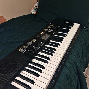 Casio Black and White Electronic Keyboard